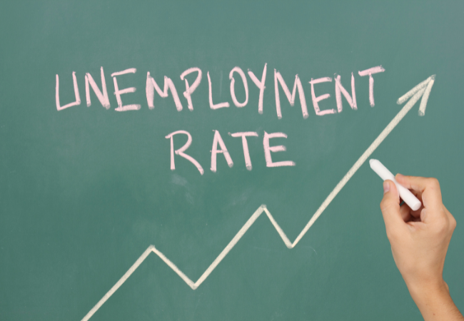 scritta unemployment rate con freccia che ne indica l'aumento