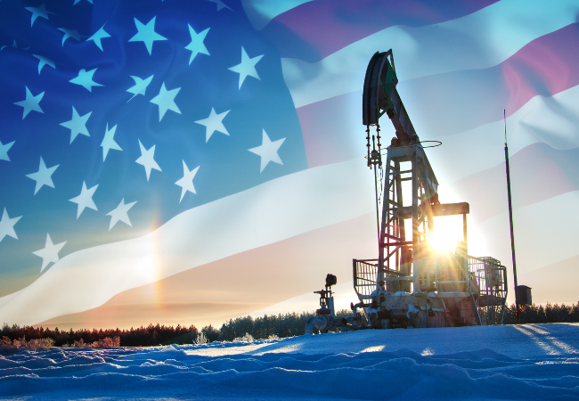immagine di compagnia petrolifera con bandiera statunitense in sovrimpressione