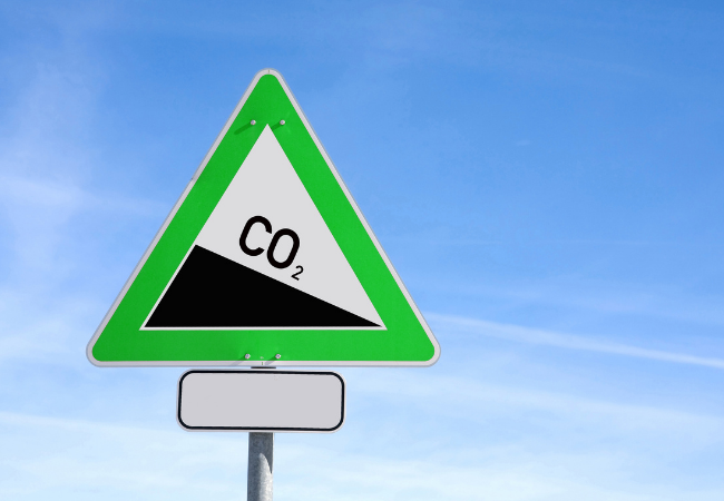 immagine di segnale stradale che indica una diminuzione della concentrazione di CO2