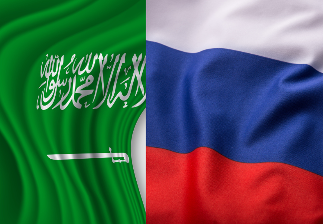Immagine della bandiera dell'Arabia Saudita e della Russia.
